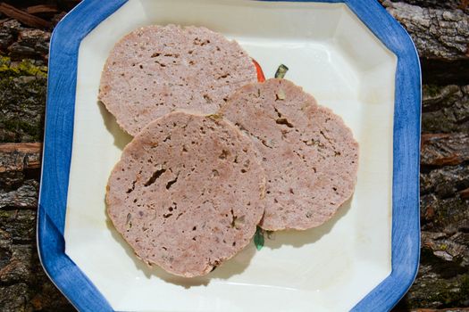 Meatloaf Italian fine cuisine with cheese and speck