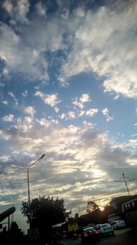 sunset and white cloud on blue sky