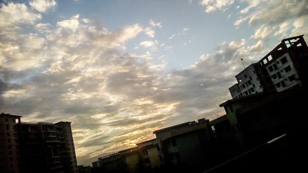 sunset on sky with city view