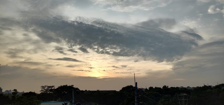 sunset and white cloud on sky with city view