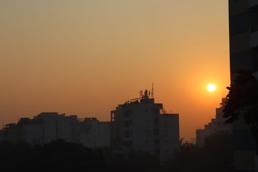 sunset on sky with city view