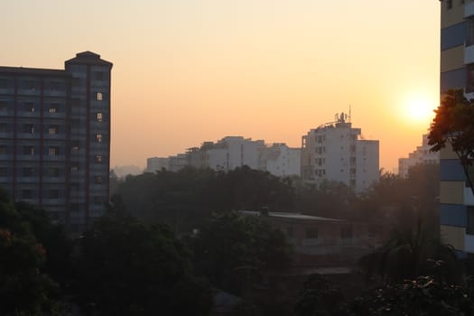 sunset on sky with city view