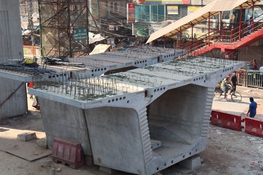 metro rail fly over line view with construction equipment