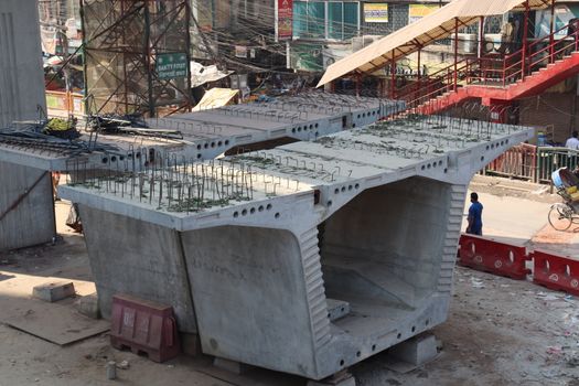 metro rail fly over line view with construction equipment