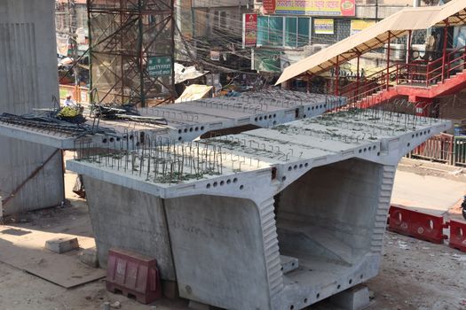 metro rail fly over line view with construction equipment