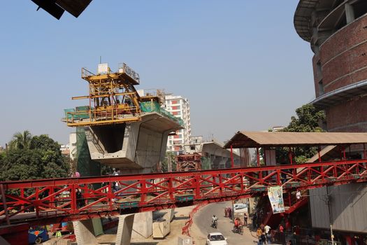 metro rail fly over line view with construction equipment