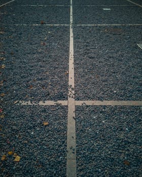 Concrete lines between holes with small stones