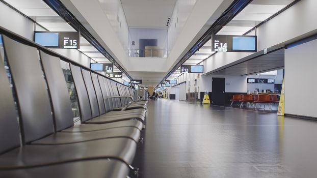 Vienna, Vienna/Austria - November 2nd 2020: Vienna Airport almost empty compared to previous years. Endless corridors with only a few people around.