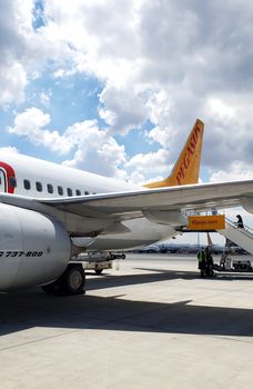 Parking of a Pegasus passenger aircraft near the terminal at the airport.