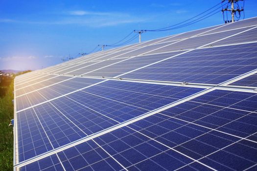 Solar panels with the blue sky.