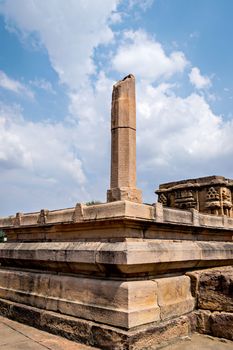 Stone pillar in front of Sanganeswara temple in Pattadakal complex, Karnatataka, India.
