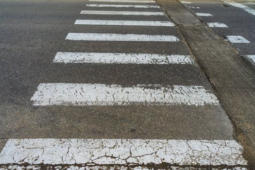 Empty pedestrian crossing, crosswalk on the road isolated