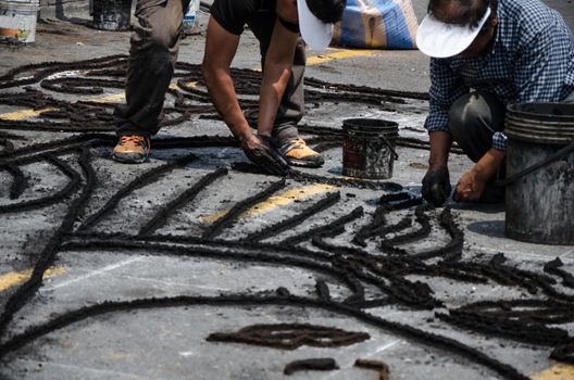 Preparation of floral carpets in the Holy Week or Easter Week in Lima - Peru