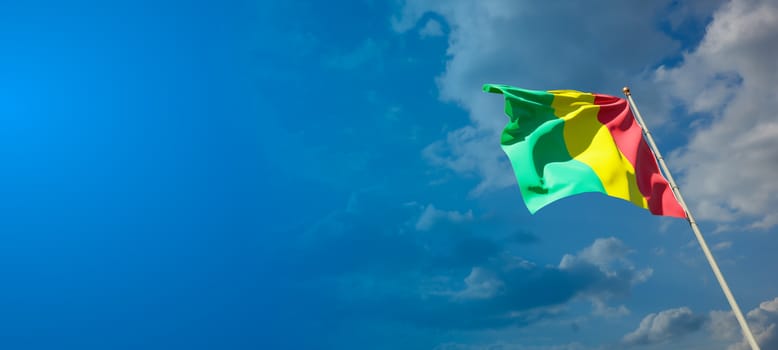 Beautiful national state flag of Guinea with blank space on wide background with place for text 3D artwork.