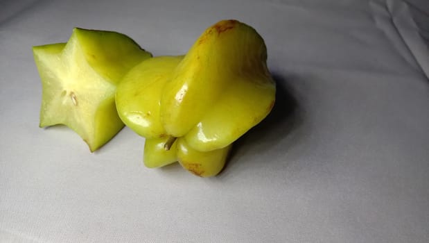 tasty and healthy carambola closeup on shop