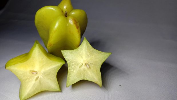 tasty and healthy carambola closeup on shop