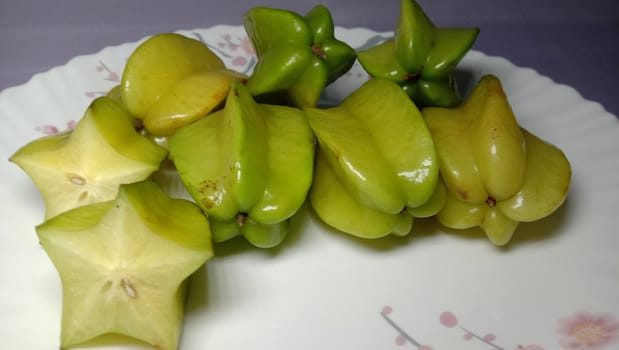 tasty and healthy carambola closeup on shop