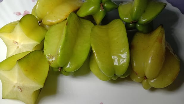 tasty and healthy carambola closeup on shop