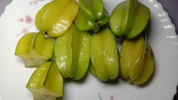 tasty and healthy carambola closeup on shop