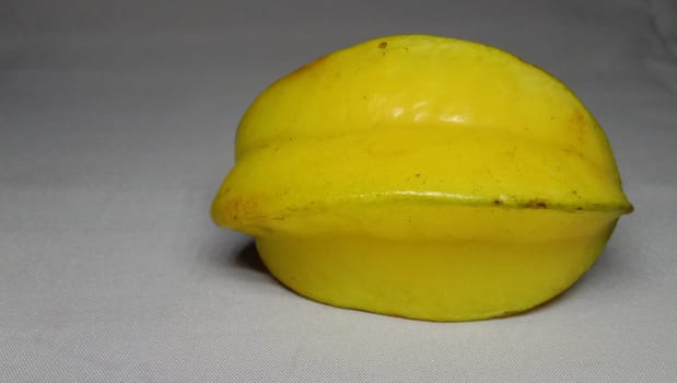 tasty and healthy carambola closeup on shop