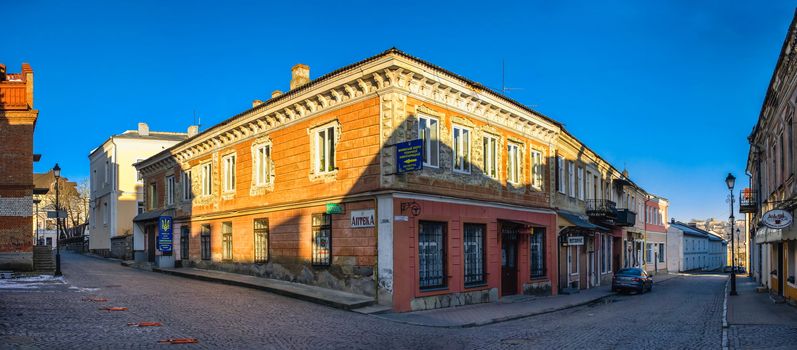 Kamianets-Podilskyi, Ukraine 01.07.2020. Historical Buildings on the old street of Kamianets-Podilskyi old town quarter on a sunny winter morning