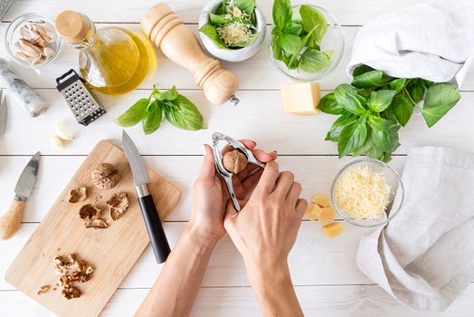 Italian Cuisine. Step by step cooking italian pesto sauce. Step 5 - cracking nuts