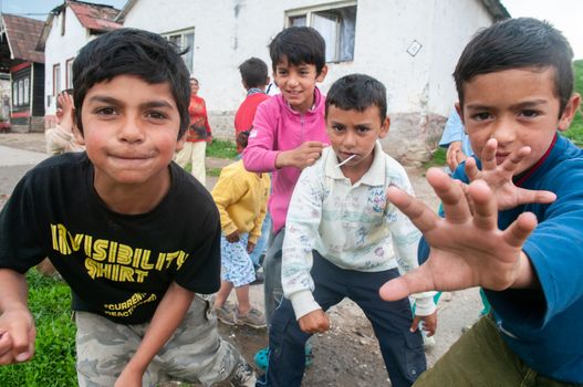 5/16/2018. Lomnicka, Slovakia. Roma community in the heart of Slovakia, living in horrible conditions. They suffer for poverty, stigma and luck of equal opportunities. Group shot of children and adolescents.