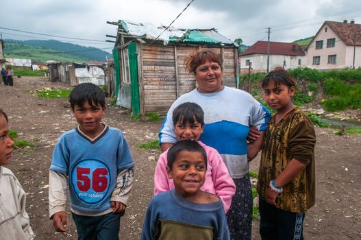 5/16/2018. Lomnicka, Slovakia. Roma community in the heart of Slovakia, living in horrible conditions. They suffer for poverty, stigma and luck of equal opportunities. Group shot of children and adolescents.