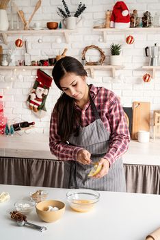 Cooking and baking. Young latin woman pouring the honey to the dough cooking at the kitchen