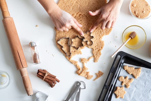 Cooking and baking. woman hands baking cookies at the kitchen, flat lay