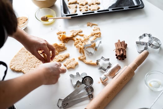 Cooking and baking. woman hands baking cookies at the kitchen