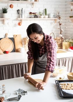 Cooking and baking. woman hands kneading dough at the kitchen