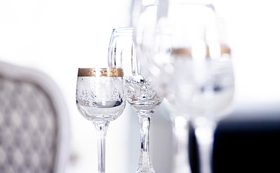 Crystal glasses as luxury table glassware and bohemian glass design, home decor and event decorations