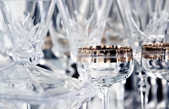 Crystal glasses as luxury table glassware and bohemian glass design, home decor and event decorations