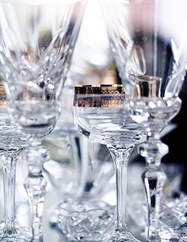 Crystal glasses as luxury table glassware and bohemian glass design, home decor and event decorations