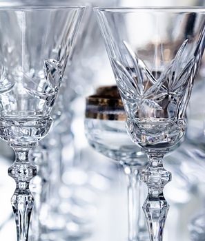 Crystal glasses as luxury table glassware and bohemian glass design, home decor and event decorations