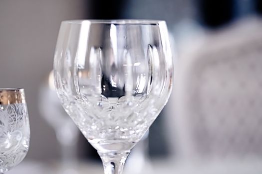 Crystal glasses as luxury table glassware and bohemian glass design, home decor and event decorations