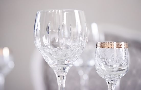 Crystal glasses as luxury table glassware and bohemian glass design, home decor and event decorations