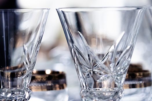 Crystal glasses as luxury table glassware and bohemian glass design, home decor and event decorations