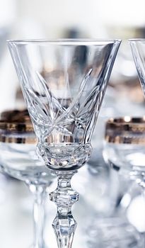 Crystal glasses as luxury table glassware and bohemian glass design, home decor and event decorations