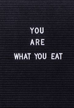 Black letter board with the words You Are What You Eat