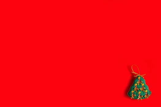 Christmas background with embroidered Christmas toys on red background, holiday, new year and Christmas concept