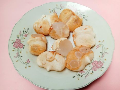 Tasty and Healthy Palmyra Palm Seeds Stock on Plate