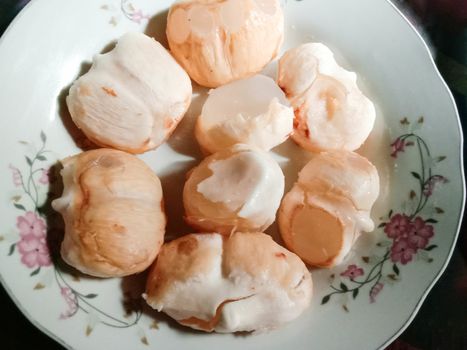 Tasty and Healthy Palmyra Palm Seeds Stock on Plate
