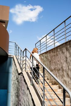 Travel, tourism and entertainment. Plus size woman photographer working at the street