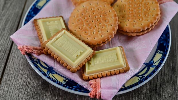food combination with biscuits on a wooden table from above