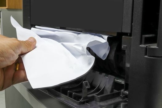 Technicians Removing Paper Stuck, Paper Jam In Printer At Office