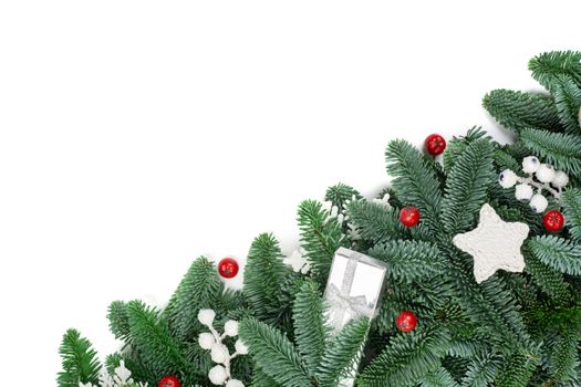 Christmas design boder frame greeting card of noble fir tree branches and baubles isolated on white background