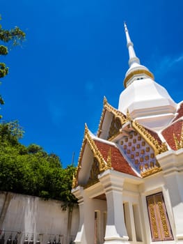 Gorgeous fine white hall in Buddhist temple and the bright blur sky