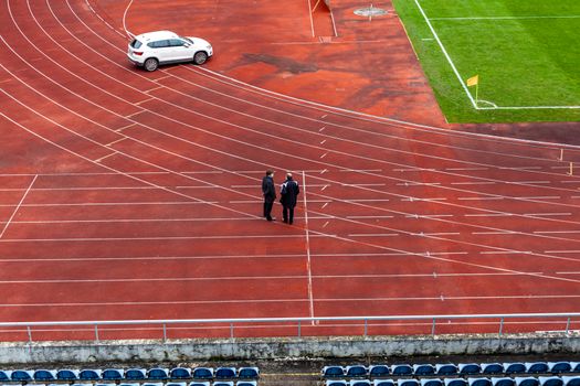 athletic stadium without spectators during a football match at the time of the coronavirus.